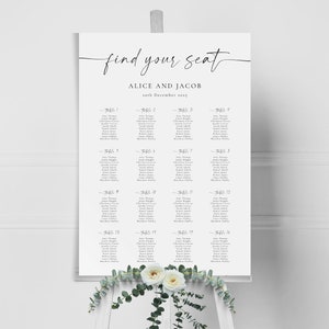 Könnte beinhalten: Ein weißer Hochzeitssitzplan mit dem Text "find your seat" in schwarzer Schrift. Die Namen Alice und Jacob sind mit dem Datum "6th December 2023" aufgeführt. Der Plan listet die Tische 1 bis 18 mit den Namen der Gäste auf.