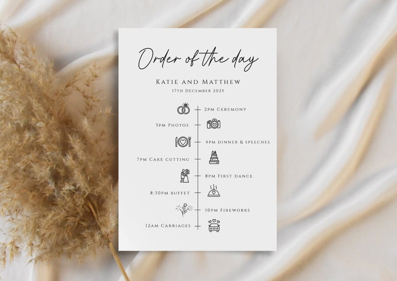 May include: A white wedding order of the day card with black text and icons. The card lists the events for the day, including the ceremony, photos, dinner, speeches, cake cutting, first dance, buffet, fireworks, and carriages. The date is December 17th, 2025.