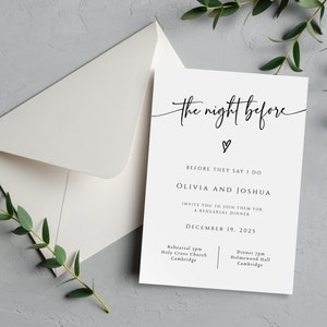 May include: A white invitation card and envelope with the text "the night before" in elegant script. The card includes details for a rehearsal dinner, with names, date, and locations. Greenery accents the scene.