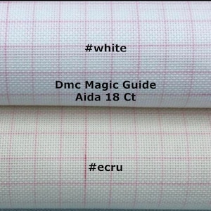 May include: Two fabric samples, one white and one ecru, with a pink grid pattern. The text "#white" and "#ecru" are visible. The text "Dmc Magic Guide Aida 18 Ct" is present, indicating a cross-stitch product.