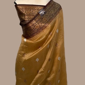 Pure kora handloom Banarasi saree.