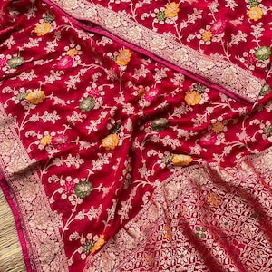 Rani colour!!!!pure Khaddi georgette Banarasi zari weaving saree.