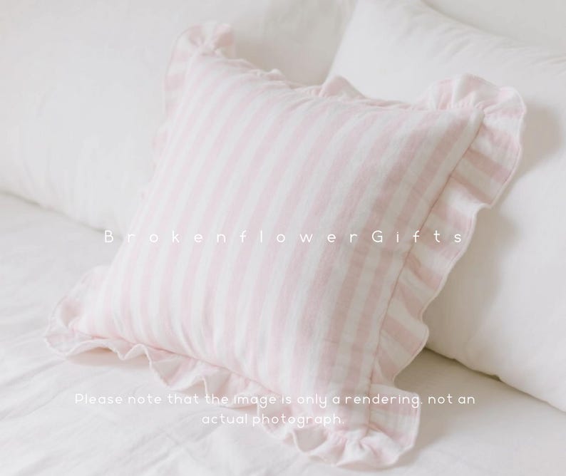 May include: A square, pink and white striped pillow with ruffled edges. The pillow is on a white bed with white sheets and pillows. The text "Brokenflower Gifts" is printed on the pillow. The text "Please note that the image is only a rendering, not an actual photograph" is also printed on the image.