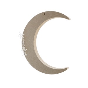 May include: A brown wooden crescent moon shape with a hole at the top for hanging.
