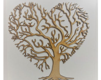 May include: A wooden heart-shaped tree wall decor with intricate branches and a brown finish.