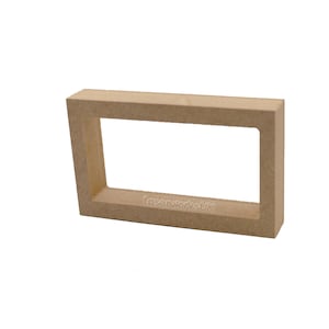 May include: A rectangular wooden frame with a cutout in the centre. The frame is made of unfinished wood and has a natural colour. The text "LaserworksUK" is visible on the frame.