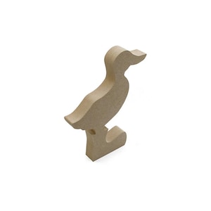 May include: A wooden cutout of a duck standing on one leg. The duck is facing to the right and has a long neck and a small beak. The duck is made of unfinished wood and is ready to be painted or stained.