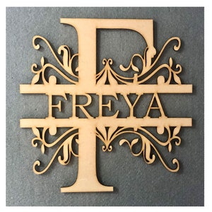 May include: Wooden cutout of the letter "F" with decorative swirls and the name "FREYA" centered below the letter.