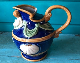 Lovely vintage majolica jug/pitcher with shell and cherub decoration