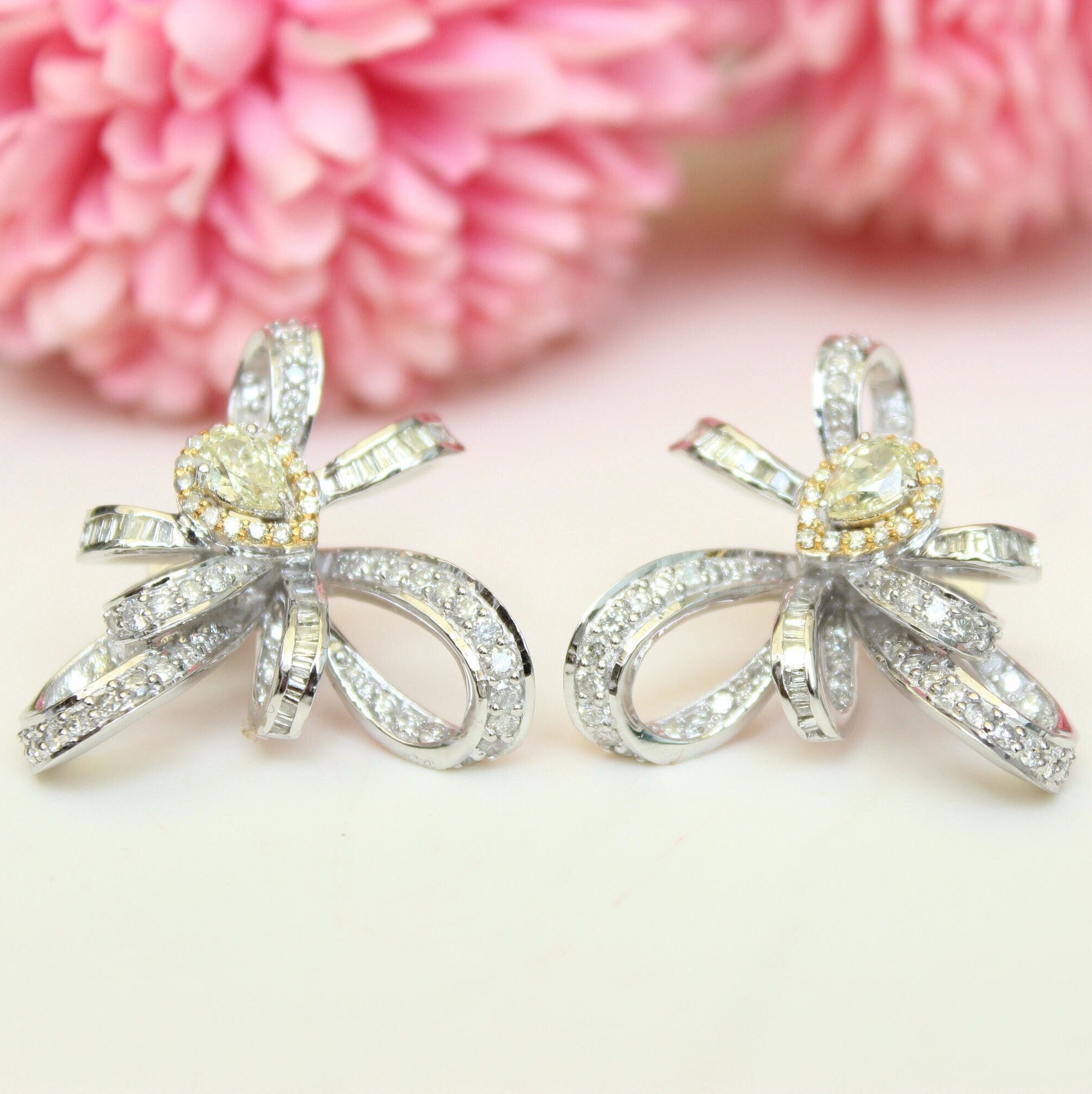 Sterling Silver with Diamond Set Bow Earrings  Zamels