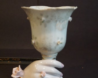 Vase with Hand pedestal and pink rose accents