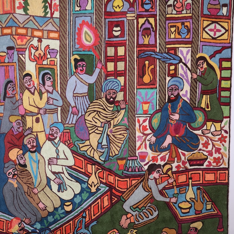 May include: A colorful embroidered tapestry depicting a scene of people gathered in a room. The tapestry features intricate details, including people in traditional clothing, a table with food and drink, and a variety of decorative elements. The tapestry is a vibrant and intricate work of art.