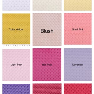 May include: A collage of fabric swatches in various colors, including white, ivory, yellow, blush, shell pink, light pink, hot pink, lavender, purple, rhythmic red, and red. Each swatch has a textured, dotted surface.