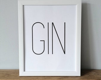 Puede incluir: Una impresión enmarcada en blanco con la palabra "GIN" en letras negras.