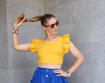 Gonna midi in lino: elastico in vita, tasche, stile cottagecore