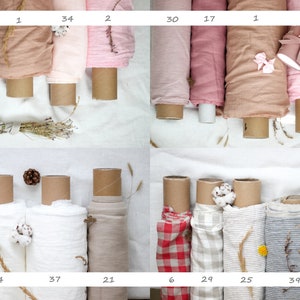 Pu&ograve; includere: Assortimento di 10 rotoli di tessuto in vari colori e fantasie, tra cui rosa, beige, bianco e rosso. I rotoli di tessuto sono disposti in due file da cinque, con ogni rotolo etichettato con un numero.