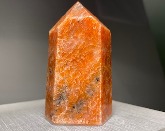 Orange Calcite Point with Black Mica Inclusions | Crystal Tower