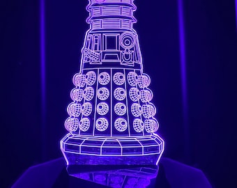 May include: A purple 3D printed light-up sculpture of a Dalek, a fictional robot from the British science fiction television series Doctor Who.
