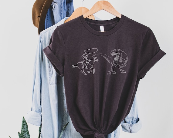 Funny Cowboy Shirt, Rodeo Apparel, Dinosaur Trex Shirt, Western Style, Cowgirl Tees, Southern T-Shirt, Gift For Dinosaur Lover, Rodeo Shirt