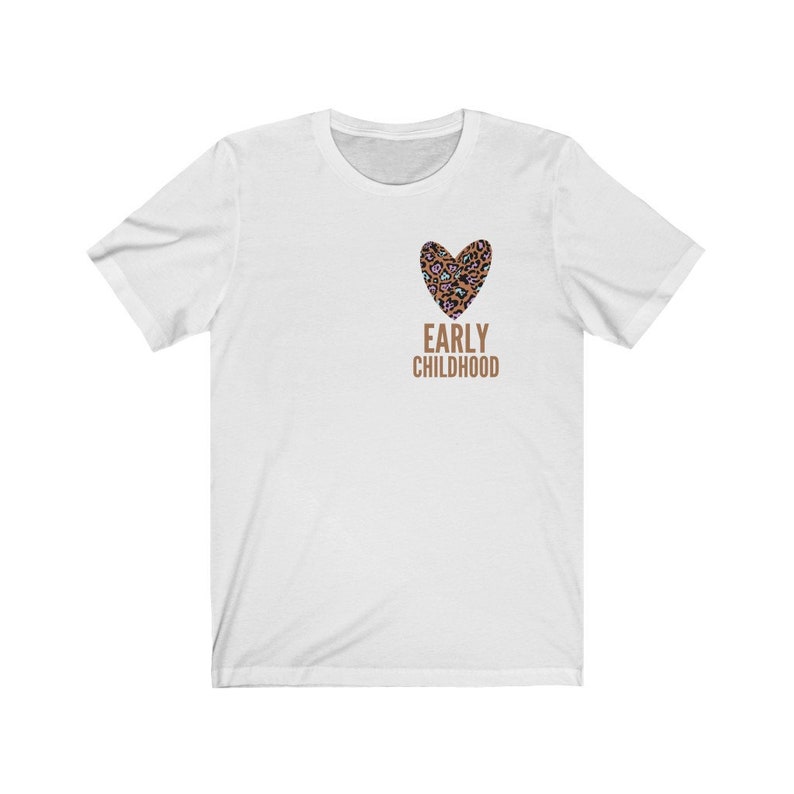 May include: White t-shirt with a brown heart design featuring a leopard print pattern. The text "EARLY CHILDHOOD" is printed below the heart.