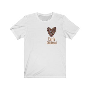 May include: White t-shirt with a brown leopard print heart and the text "Early Childhood" in brown.
