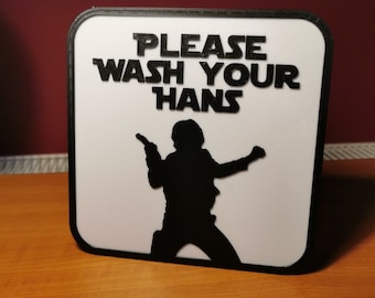 Könnte beinhalten: Ein weißes Schild mit schwarzem Text und einer Silhouette von Han Solo aus Star Wars. Das Schild lautet "Please Wash Your Hans".