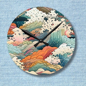 May include: A round clock with a colourful wave design. The clock face features a black clock hand and a black hour hand. The waves are in shades of blue, green, orange, pink, and yellow.