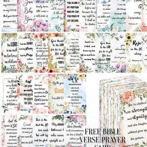 May include: A stack of Bible verse prayer cards with floral designs and inspirational quotes. The cards feature various colors and fonts, with the words "FREE BIBLE VERSE PRAYER CARD" at the bottom.