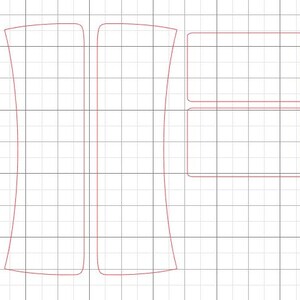 May include: A set of two curved, blank, white labels with a rectangular, blank, white label below them. All labels are outlined in red.