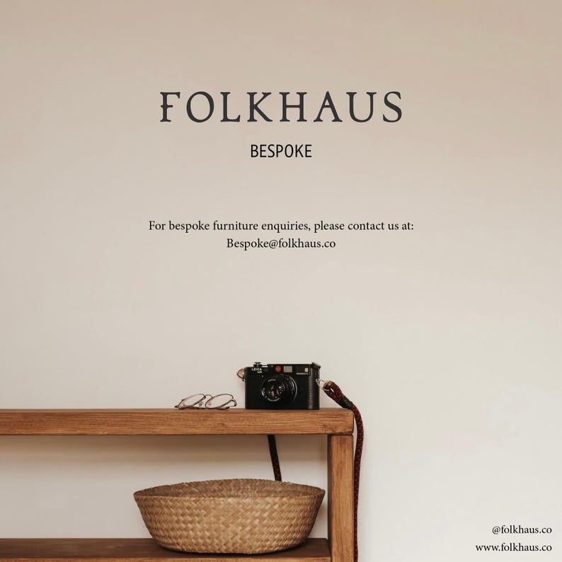 May include: A wooden shelf with a wicker basket, a vintage camera, and a pair of glasses. The text "FOLKHAUS BESPOKE" is at the top of the image. The text "For bespoke furniture enquiries, please contact us at: Bespoke@folkhaus.co" is below the shelf. The text "@folkhaus.co www.folkhaus.co" is at the bottom of the image.