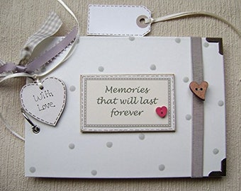 personalised photo album/journal/scrapbook/memory. memories that will last forever.. or any wording of your choice
