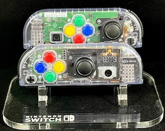 Joy-cons personalizados de Nintendo en azul glaciar transparente con botones arcoíris