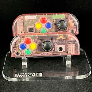 Cherry Pink Clear Nintendo Joycons Set with Rainbow Buttons
