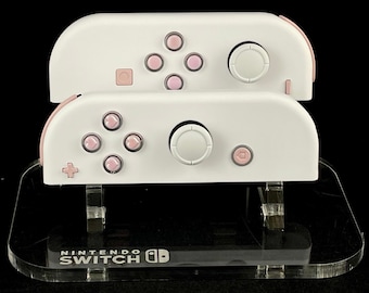White Nintendo Joycons with Pink Pastel Heart buttons