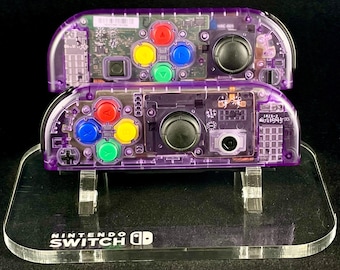 Atomic Purple Nintendo Joycons w/ Rainbow buttons