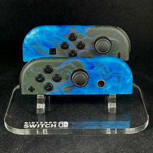 Joycons Nintendo personnalisés flamme bleue