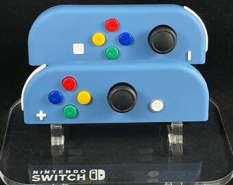 Conjunto de Joy-Con azul marino con botones arcoíris y blancos