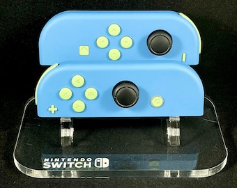 Conjunto de Joy-Con de Nintendo en color azul Airforce con botones verde matcha.