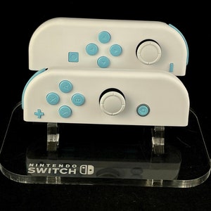 Custom White Nintendo joycons with Heaven Blue Buttons & white joysticks