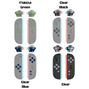 May include: Four sets of Nintendo Switch Joy-Con controllers in various color schemes. The sets include Matcha Green, Clear Black, Clear Blue, and Clear. Each set includes two controllers and two thumbstick caps. The text "Matcha Green", "Clear Black", "Clear Blue", and "Clear" are displayed.