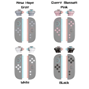 May include: Four sets of Nintendo Switch Joy-Con controllers in gray, pink, white, and black. Each set includes two controllers and two thumbstick caps. The text "New Hope Gray", "Cherry Blossom Pink", "White", and "Black" are displayed.