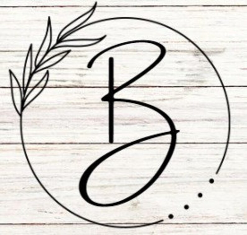 May include: A black and white illustration of the letter "B" in a circle with a leafy branch on the left side. The background is a white woodgrain pattern.