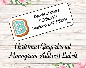 May include: A white label with a gingerbread cookie letter B on it. The label says "Bandit Stickers PO Box 10 Maricopa, AZ 85139 CC005". Below the label is the text "Christmas Gingerbread Monogram Address Labels".