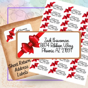 May include: Sheet of return address labels with a red bow design. The labels feature the text "Zack Bowman 8874 Ribbon Way Phoenix AZ 21091".