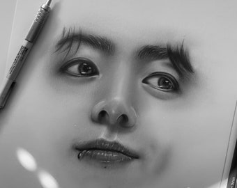 May include: Black and white pencil drawing of a person's face. The person has a piercing on their lower lip. The drawing is signed "Juuda" and includes the social media handle "@sinutiae".
