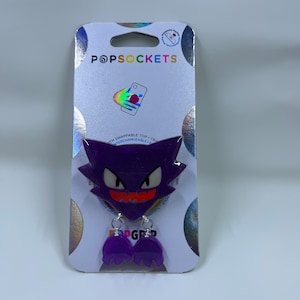 Authentic PopSocket with glow in the dark anime poke haunter, keychain, badge reel, magsafe, charm, gaming
