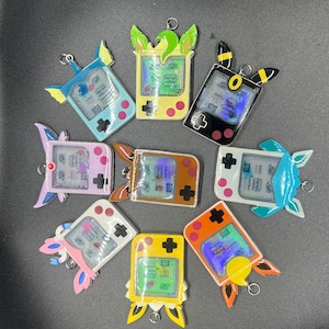 Poke anime eeveelution gameboy portachiavi, portaborse, eevee, sylveon, espeon, umbreon, vaporeon, leafeon, jolteon, glaceon, flareon,