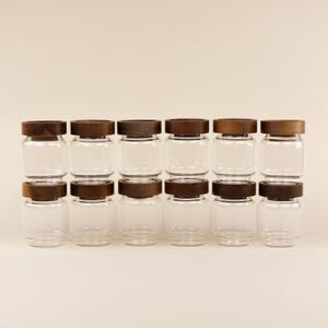 Set of 12 Mini Glass Canisters with Acacia Wood Lids (Holds 140ml) | Pantry Storage Jar for Kitchen Organization of Spices, Seeds & More