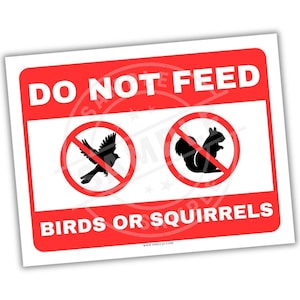 May include: A rectangular red and white sign with the text "DO NOT FEED BIRDS OR SQUIRRELS". The sign features a black silhouette of a bird and a squirrel inside a red circle with a red line through it.