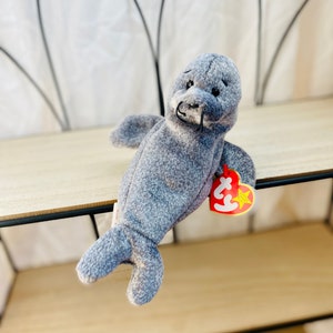 Vintage Slippery the Robbe - Rentner Mütze Baby